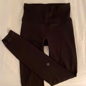 Lululemon black high rise tight full length leggings. Size 4. Runs small.